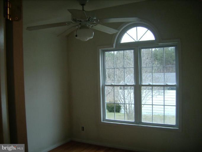 6024 Towles Mill Road Partlow, VA 22534 - Photo 2 of 11 an empty room with a window