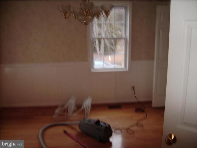 6024 Towles Mill Road Partlow, VA 22534 - Photo 11 of 11 a bathroom with a toilet and a window