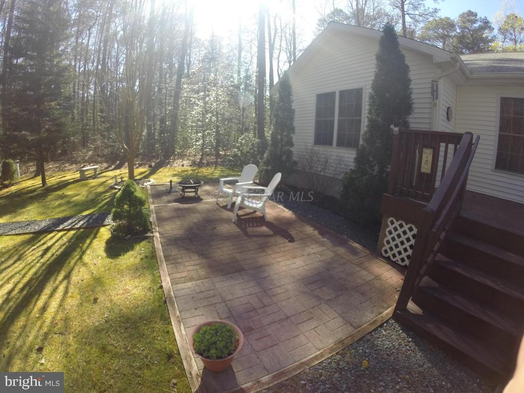 18 Falcon Bridge Road Ocean Pines, MD 21811 - Photo 17 of 21 a view of balcony with a potted plant