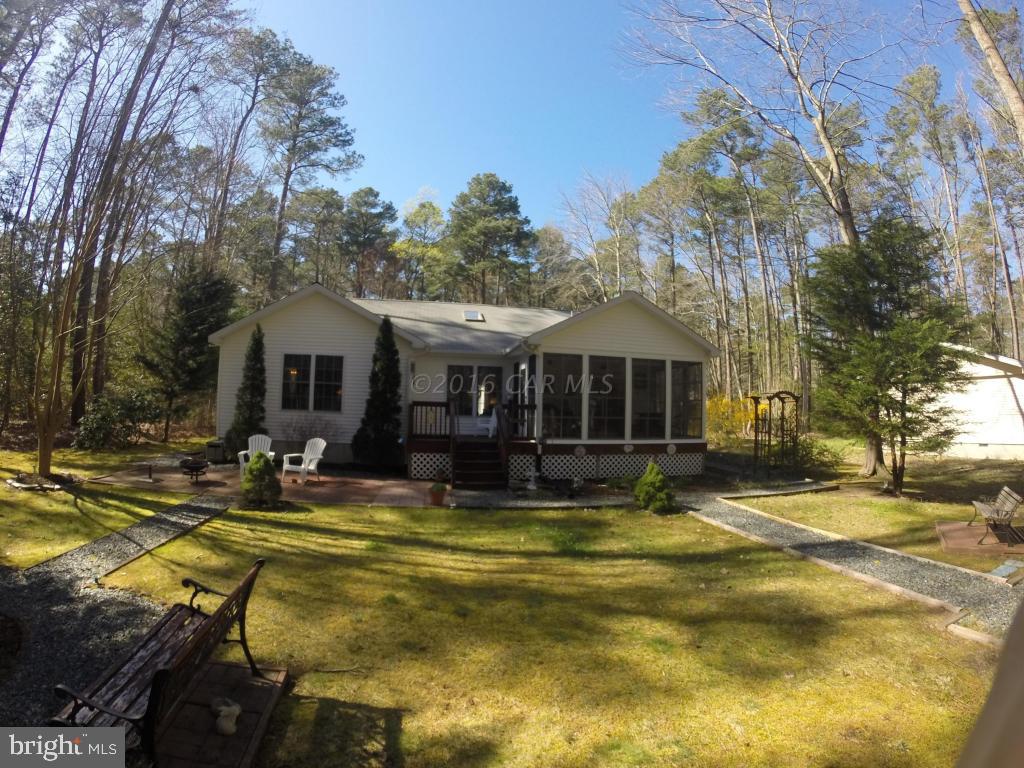 18 Falcon Bridge Road Ocean Pines, MD 21811 - Photo 18 of 21 a view of a house with swimming pool and a yard