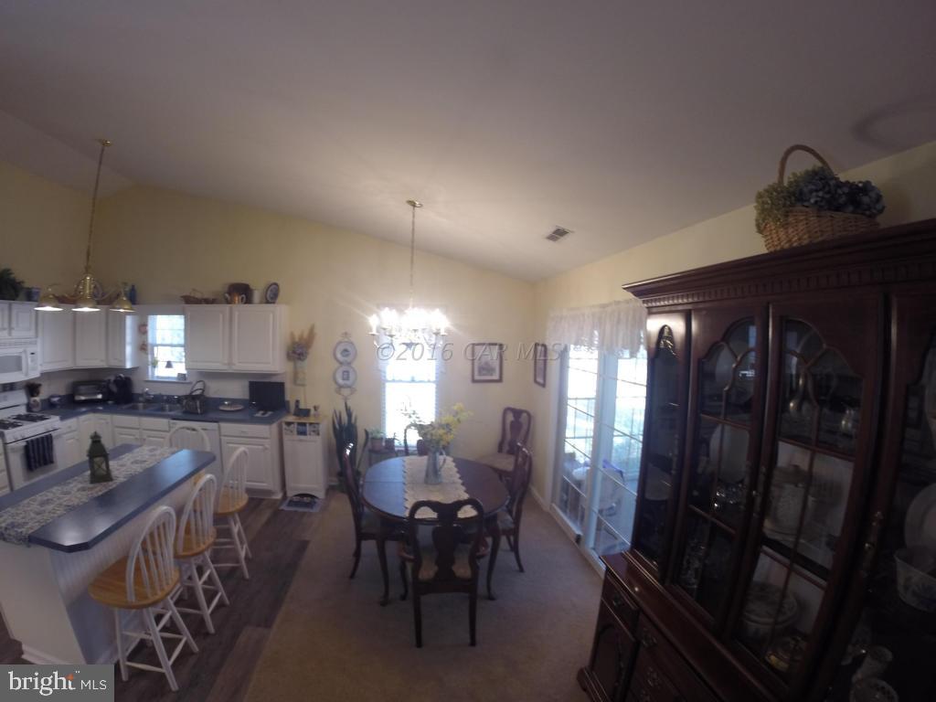 18 Falcon Bridge Road Ocean Pines, MD 21811 - Photo 5 of 21 a view of a dining room with furniture