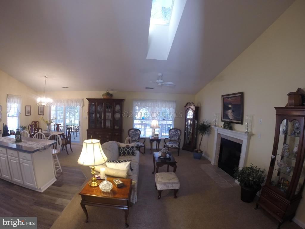 18 Falcon Bridge Road Ocean Pines, MD 21811 - Photo 6 of 21 a living room with furniture fireplace and a window