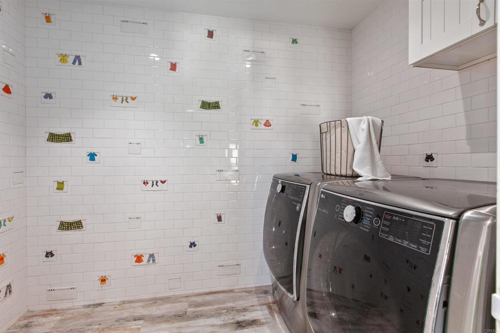 6817 Vianda Court Carlsbad, CA 92009 - Photo 56 of 74 2 laundry rooms - 1 upstairs and 1 down.