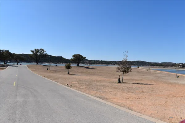a view of road and trees