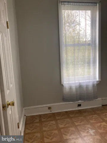 a view of a window in an empty room