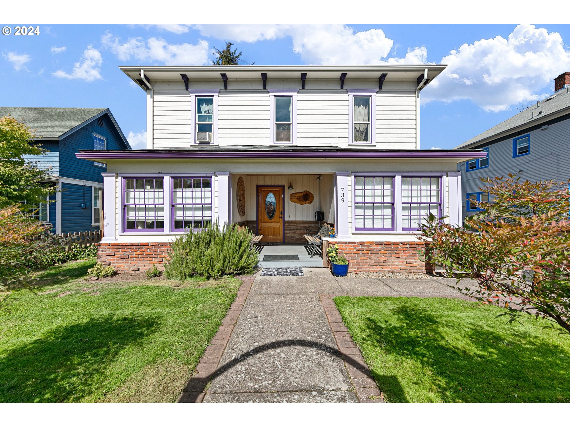 739 West 5th Avenue Eugene, OR 97402 - Photo 1 of 31 front view of a house with a yard