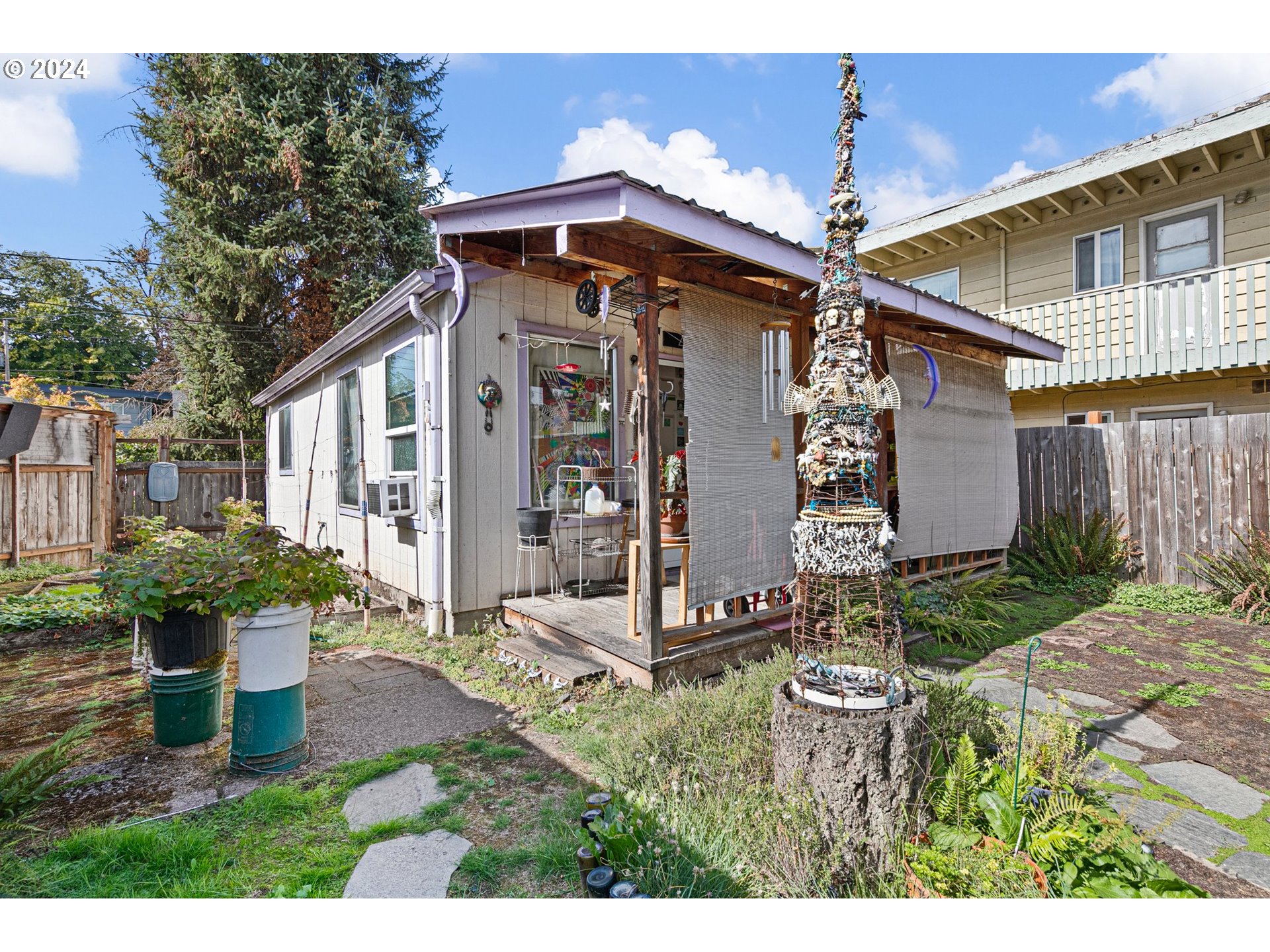 739 West 5th Avenue Eugene, OR 97402 - Photo 27 of 31 a view of a house with yard and garden