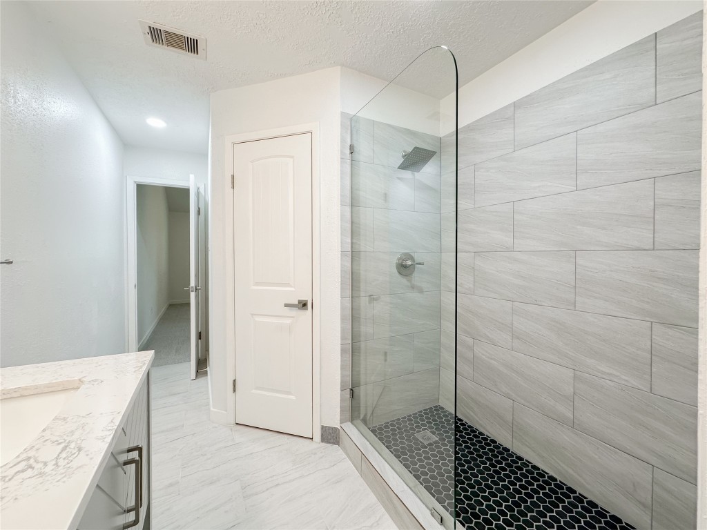 22103 Diane Drive Spring, TX 77373 - Photo 15 of 23 a bathroom with a shower and a sink