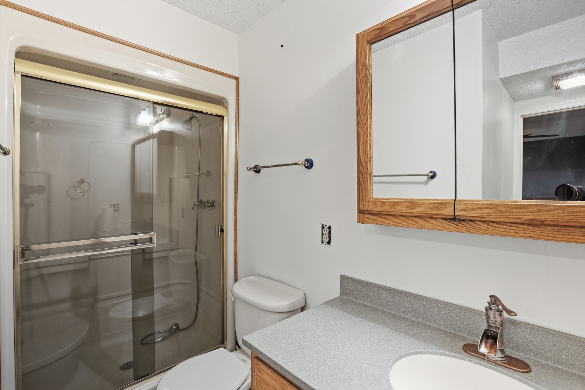 888 Cook Road Tullahoma, TN 37388 - Photo 17 of 23 a bathroom with a toilet a sink and shower