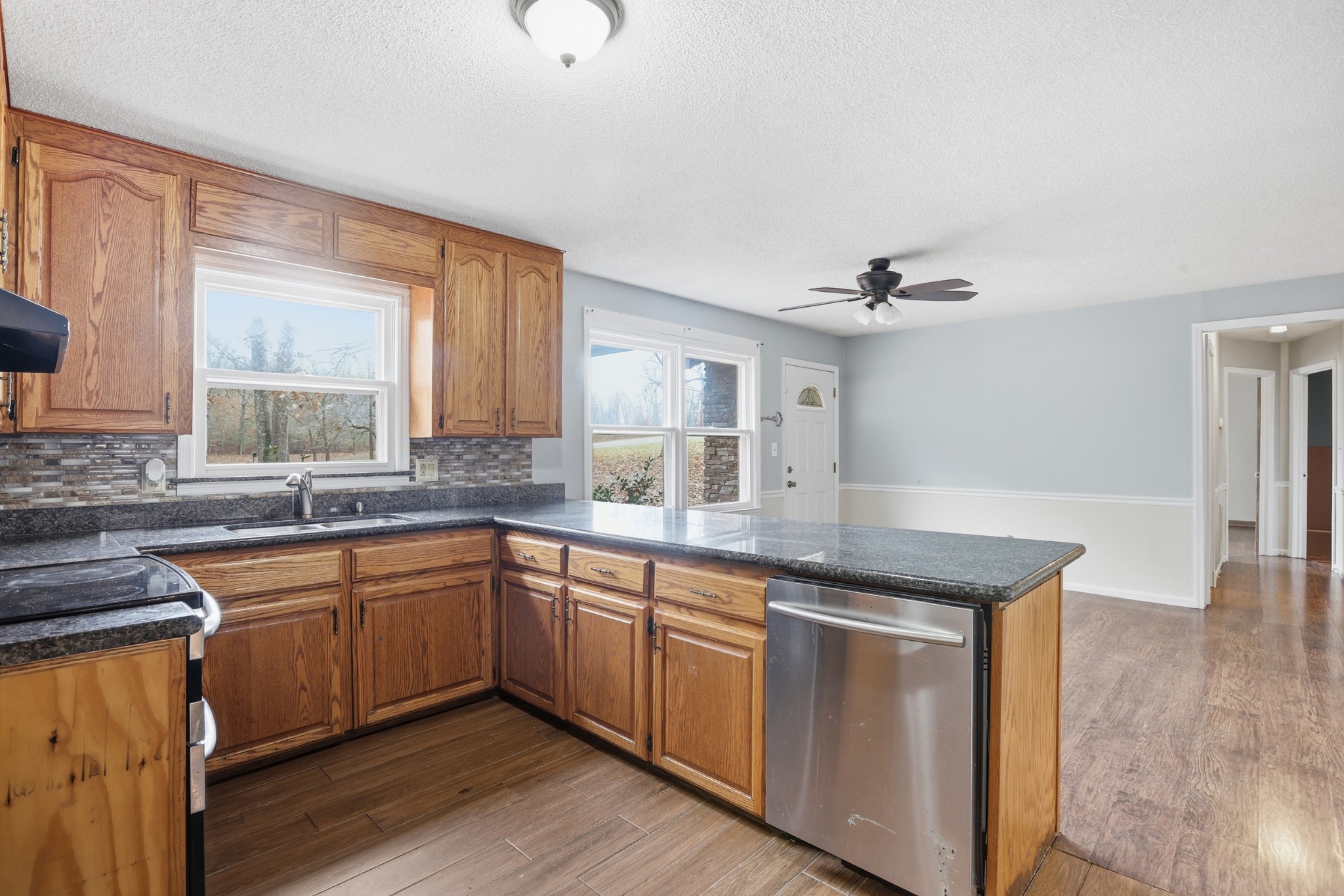 888 Cook Road Tullahoma, TN 37388 - Photo 2 of 23 a kitchen with sink stove and cabinets