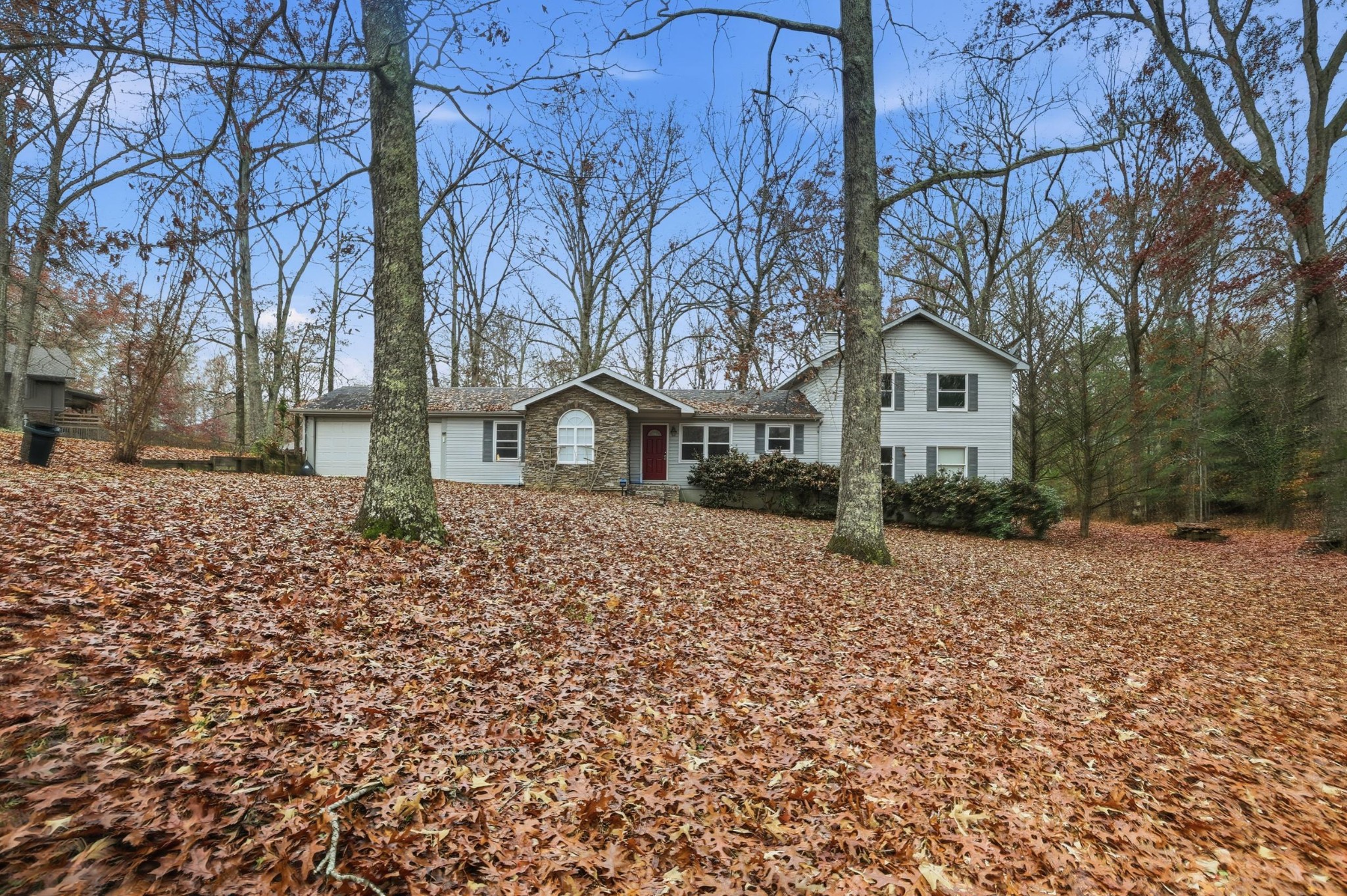 888 Cook Road Tullahoma, TN 37388 - Photo 22 of 23 a front view of a house with a yard