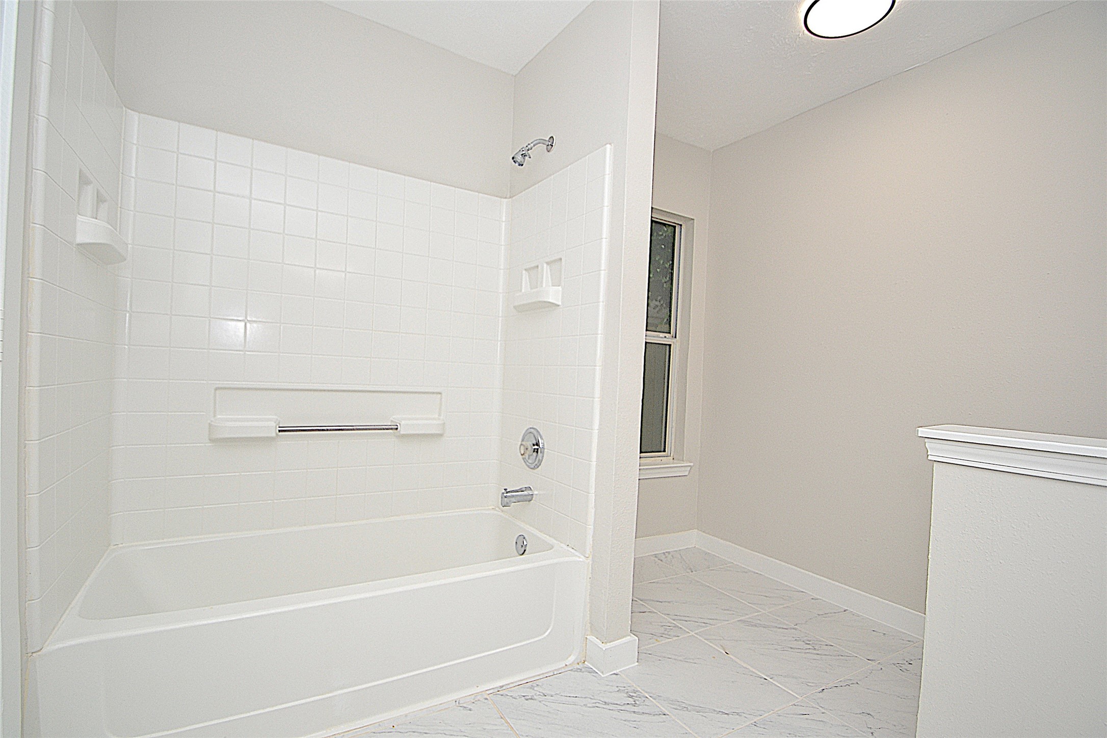 631 Aweigh Drive Crosby, TX 77532 - Photo 10 of 15 a bathroom with a bathtub and a shower