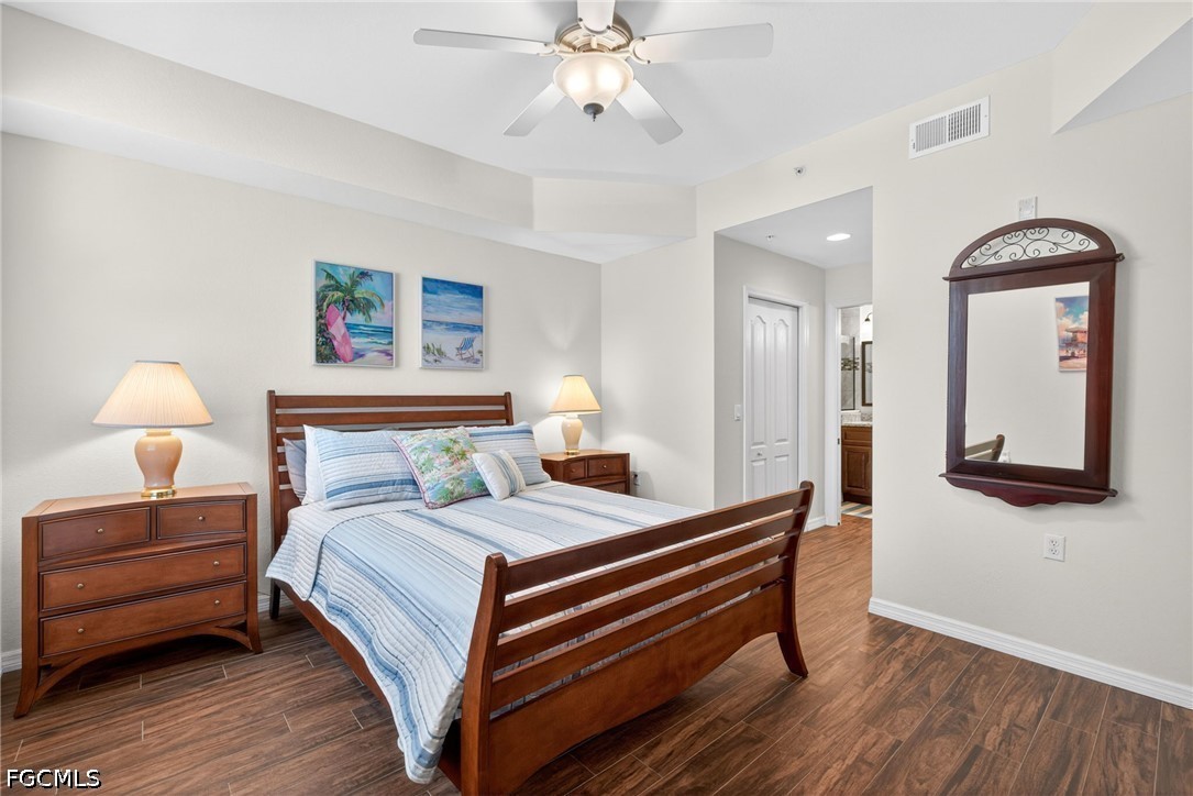 8251 Pathfinder Loop, Unit 621 Fort Myers, FL 33919 - Photo 15 of 30 a bedroom with a bed and a dresser