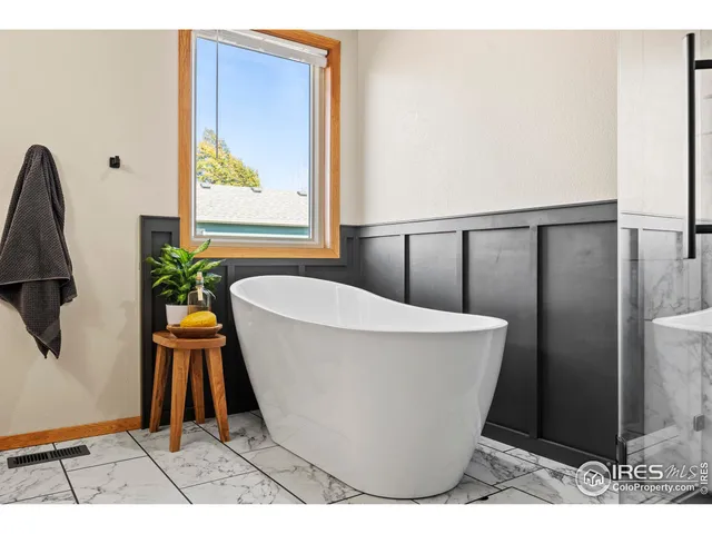 a view of a bathtub in a bathroom