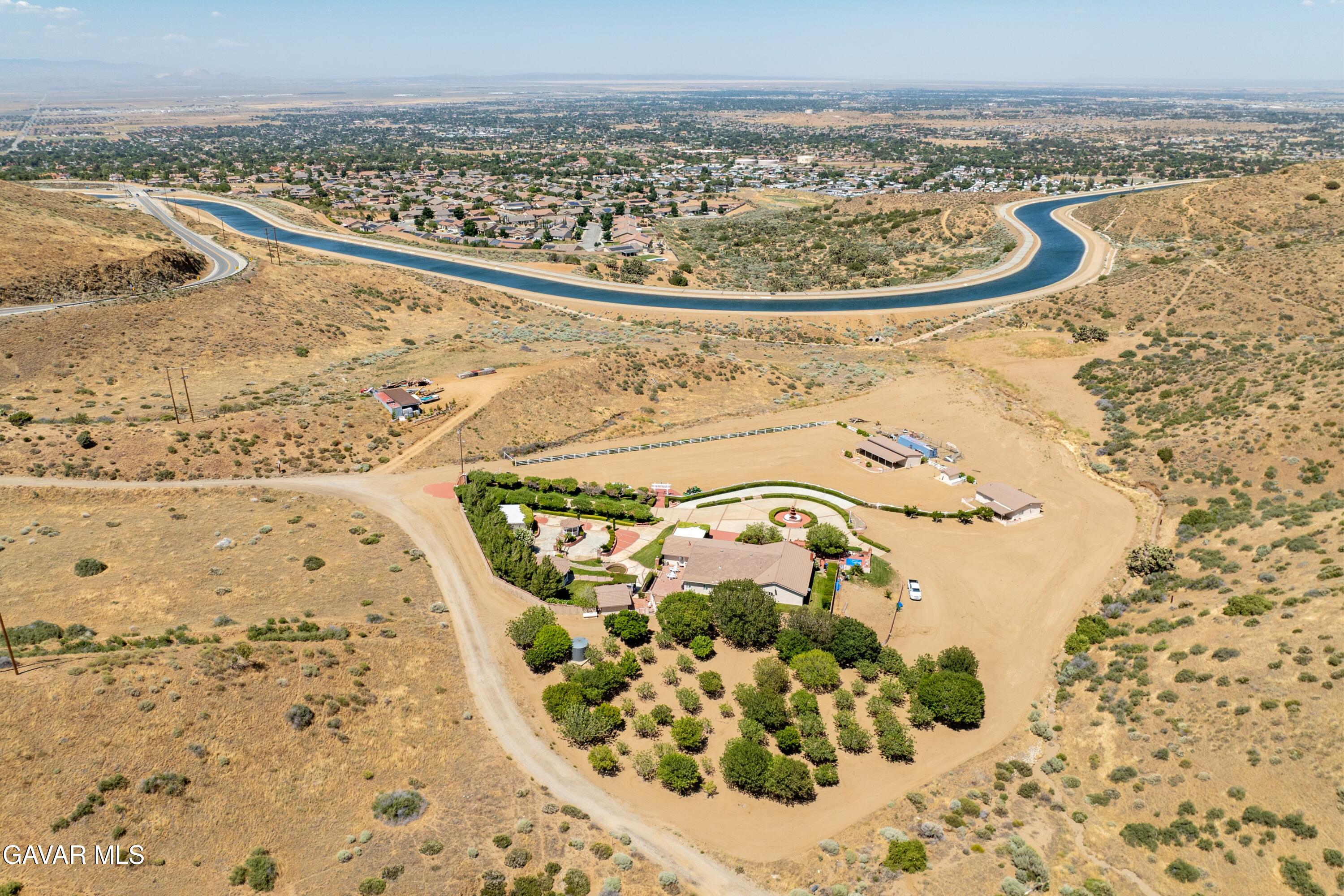 5801 Hacienda Ranch Road Palmdale, CA 93551 - Photo 66 of 69 a view of a swimming pool with a yard
