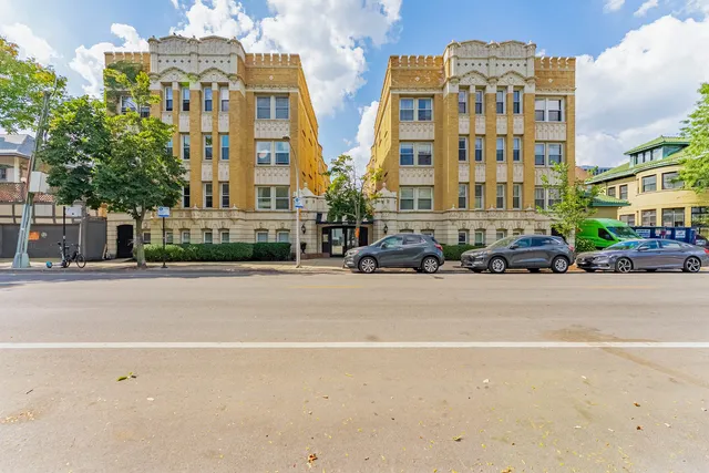 a view of a building with a street