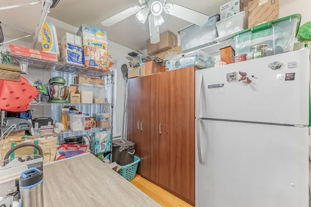 a kitchen with stainless steel appliances a stove a sink and cabinets