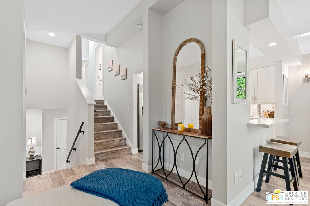 53615 Silver Fir Drive Idyllwild, CA 92549 - Photo 23 of 49 a view of entryway with wooden floor and stairs