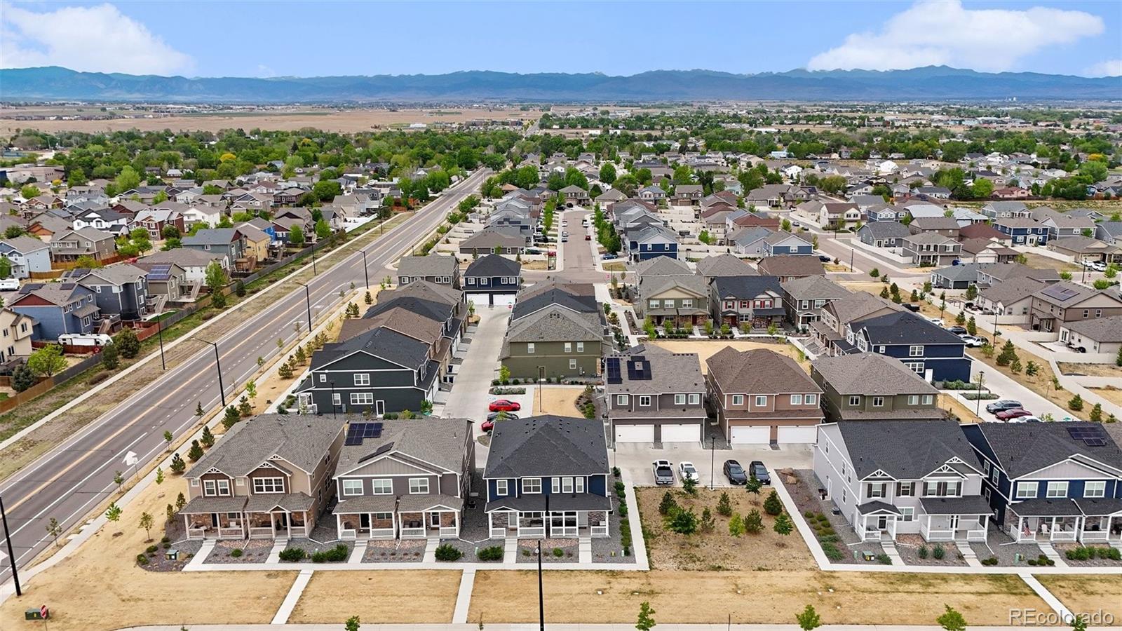 7008 Kali Court Frederick, CO 80530 - Photo 24 of 28 a view of a city with a mountain