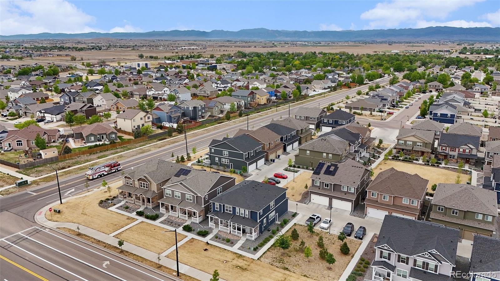 7008 Kali Court Frederick, CO 80530 - Photo 25 of 28 an aerial view of a city with lots of residential buildings