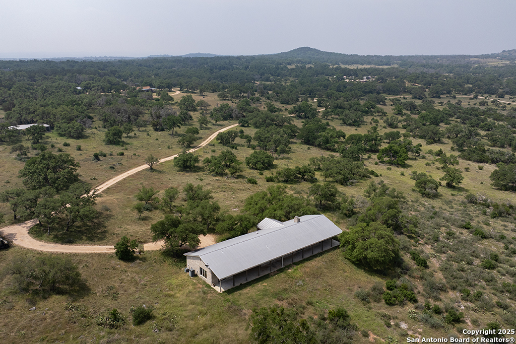 306 Fieldstone Johnson City, TX 78636 - Photo 30 of 31 an aerial view of a house with a yard