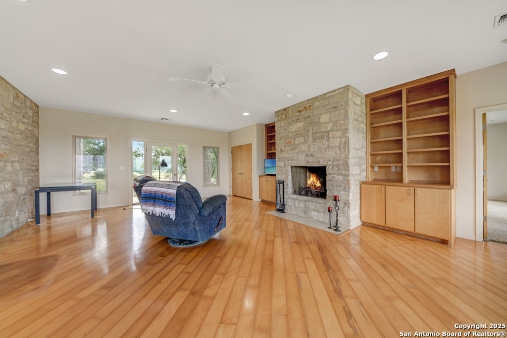 306 Fieldstone Johnson City, TX 78636 - Photo 4 of 31 a living room with furniture and a fireplace