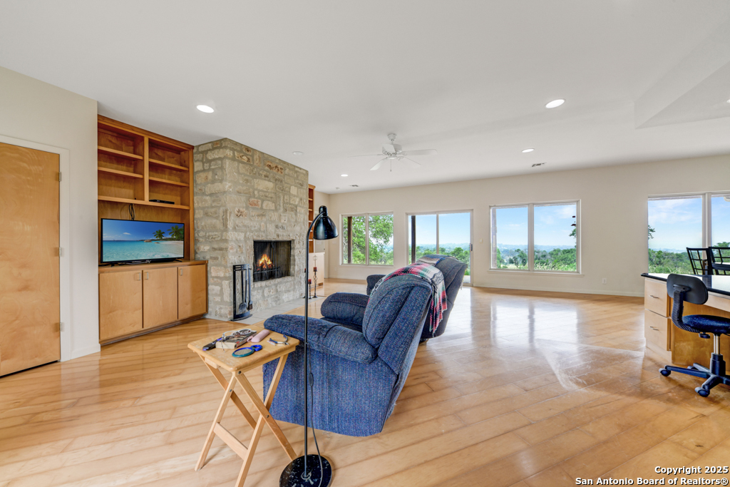 306 Fieldstone Johnson City, TX 78636 - Photo 5 of 31 a living room with furniture and a fireplace