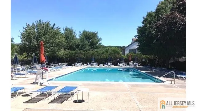 a sign that is in front of flowers