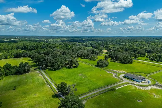 a view of a golf course with a lake