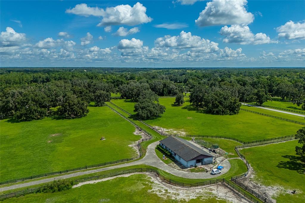 15795 Northwest 86th Avenue Reddick, FL 32686 - Photo 14 of 83 a view of a golf course with a yard