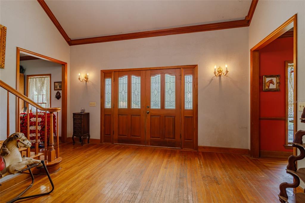 15795 Northwest 86th Avenue Reddick, FL 32686 - Photo 30 of 83 a view of a livingroom with hardwood and furniture