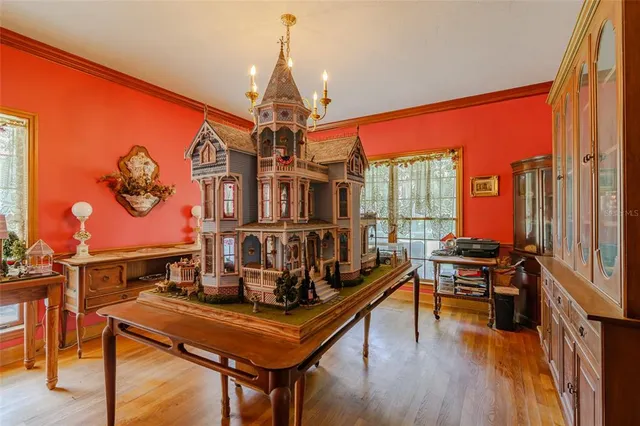 a bathroom with a granite countertop toilet sink and mirror
