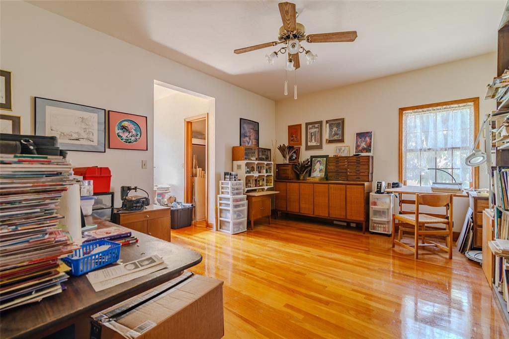 15795 Northwest 86th Avenue Reddick, FL 32686 - Photo 55 of 83 a living room with furniture and a flat screen tv