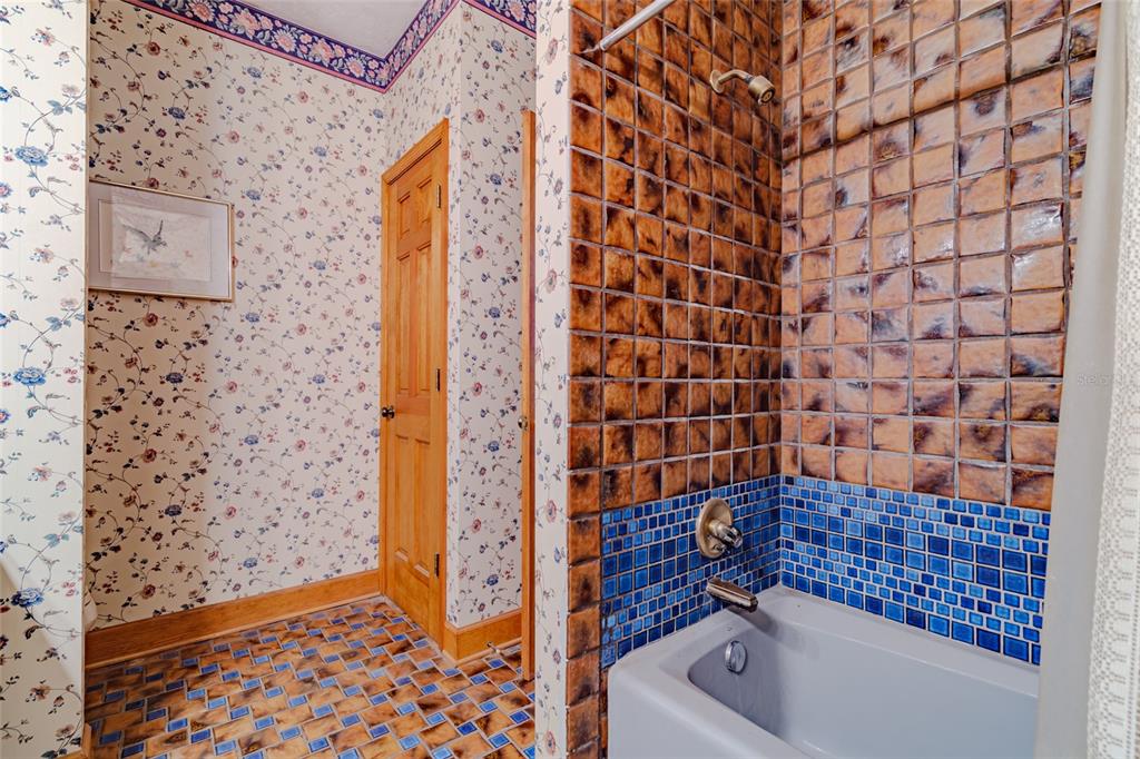 15795 Northwest 86th Avenue Reddick, FL 32686 - Photo 56 of 83 a bathroom with a bathtub and shower