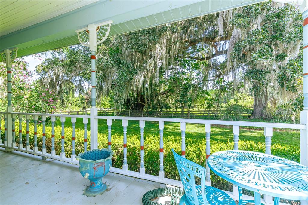 15795 Northwest 86th Avenue Reddick, FL 32686 - Photo 61 of 83 a view of a two chairs in the balcony