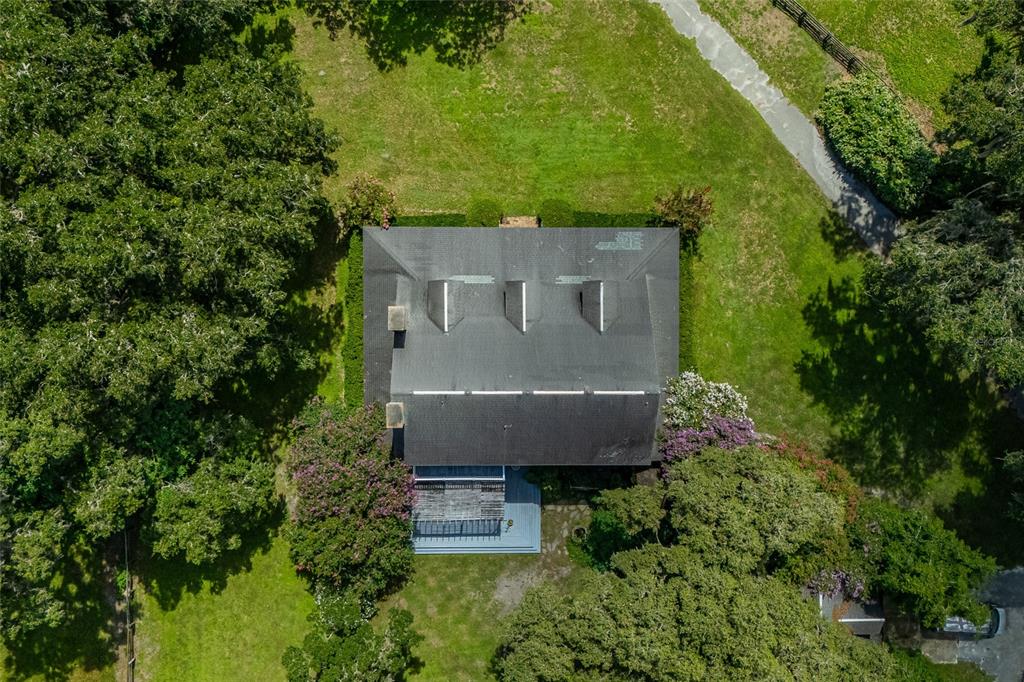 15795 Northwest 86th Avenue Reddick, FL 32686 - Photo 8 of 83 an aerial view of a house with a yard