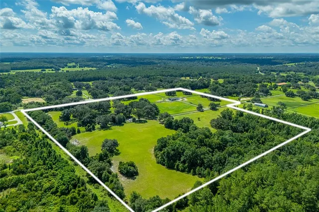 a view of a golf course with a yard