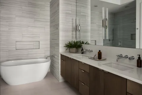 a bathroom with a bathtub and sink