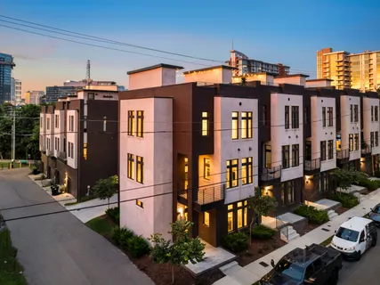 a front view of a building with a street