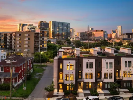 a view of a city with tall buildings