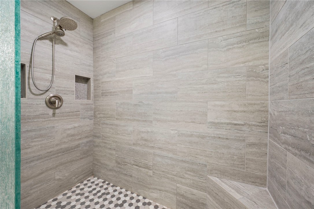 304 Dunn Street Bryan, TX 77801 - Photo 13 of 29 Large walk-in shower in Primary Bathroom with a ti