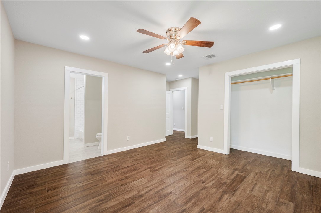 304 Dunn Street Bryan, TX 77801 - Photo 15 of 29 Unfurnished bedroom with wood finished floors, a c