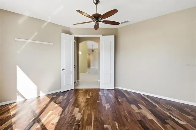 a bathroom with a sink toilet and a mirror