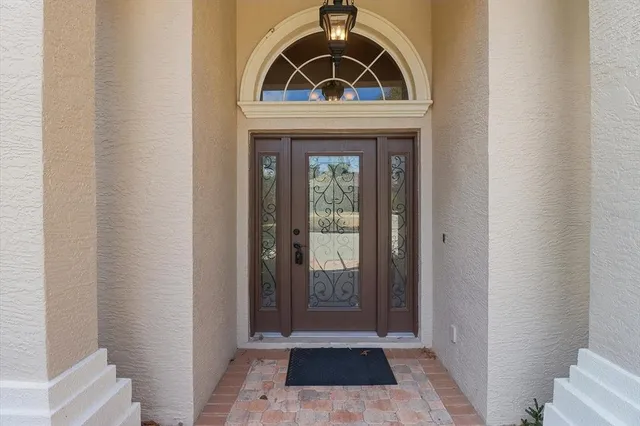 a view of a door and a window