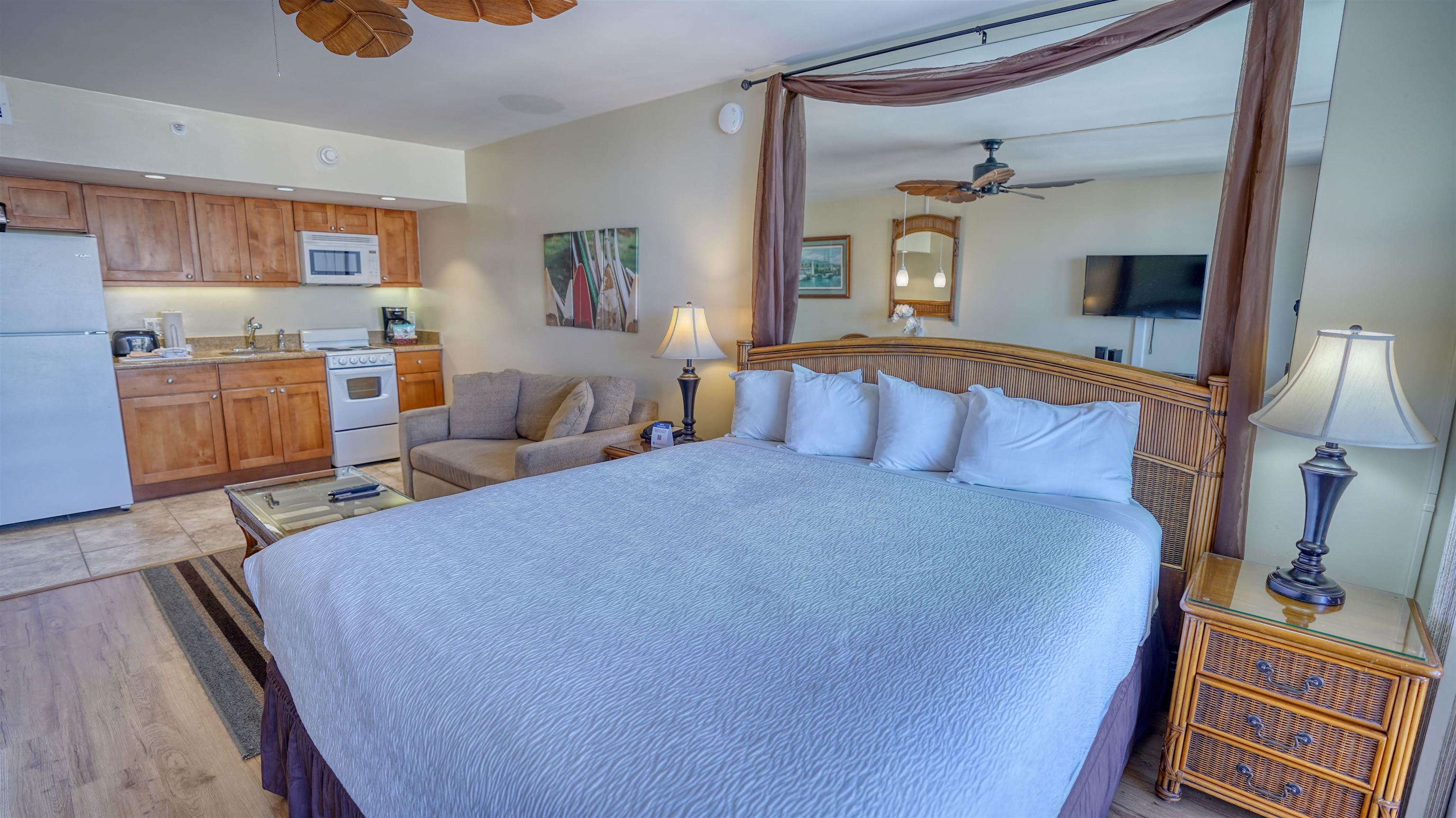 4365 Lower Honoapiilani Road, Unit 1018 Lahaina, HI 96761 - Photo 15 of 35 a bedroom with furniture and a window
