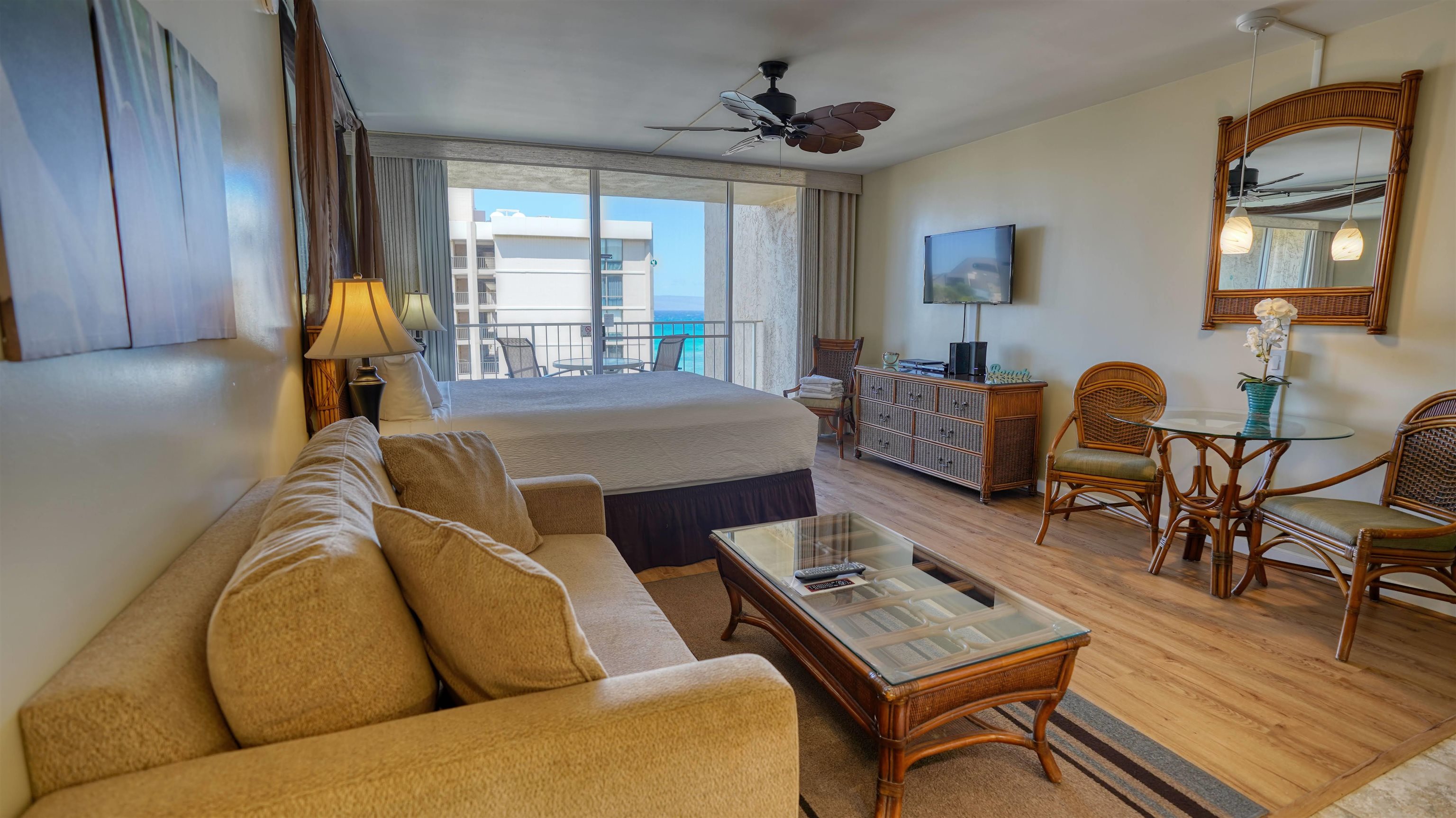 4365 Lower Honoapiilani Road, Unit 1018 Lahaina, HI 96761 - Photo 2 of 35 a living room with furniture and wooden floor