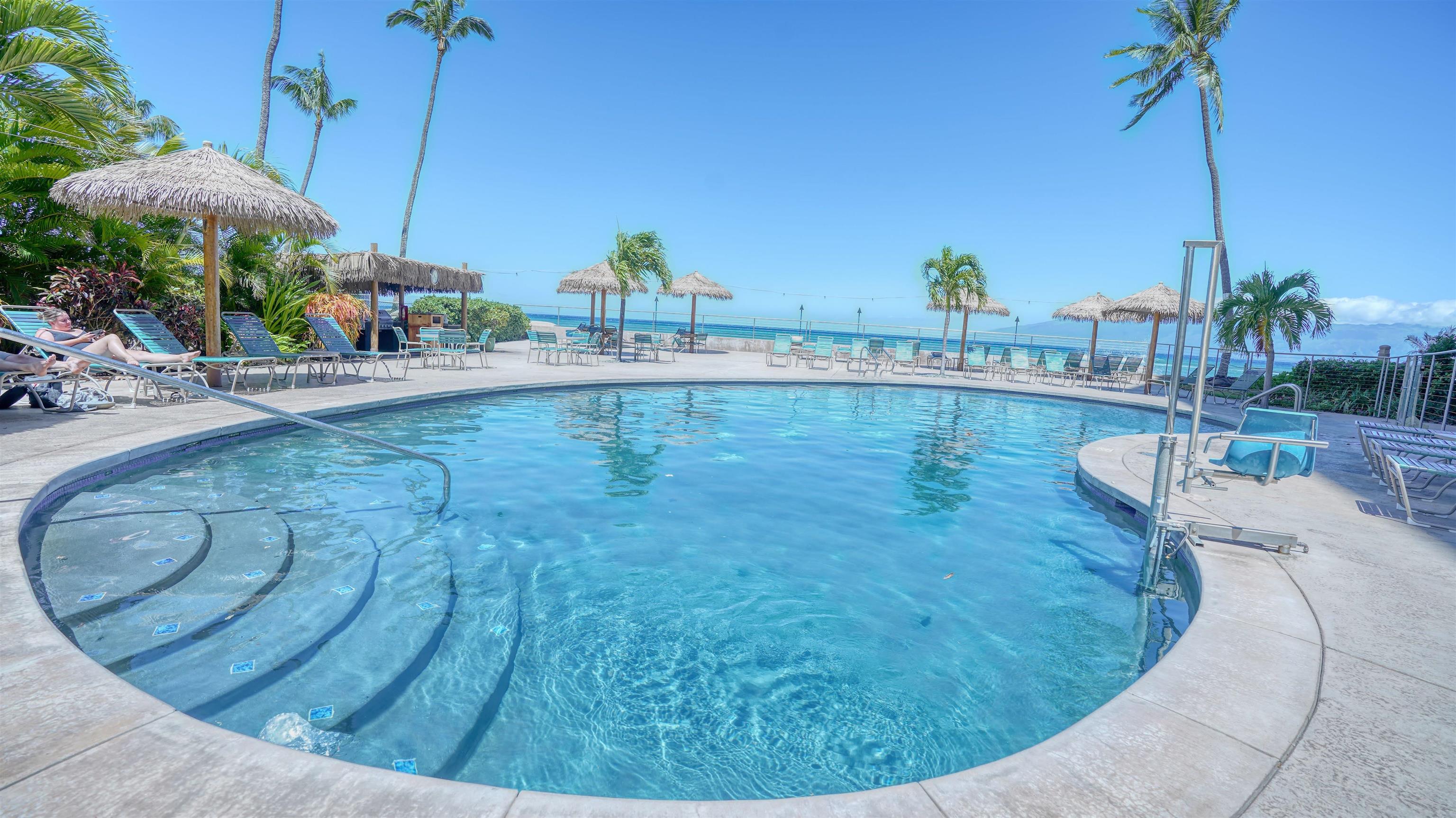 4365 Lower Honoapiilani Road, Unit 1018 Lahaina, HI 96761 - Photo 30 of 35 a view of a swimming pool from a balcony