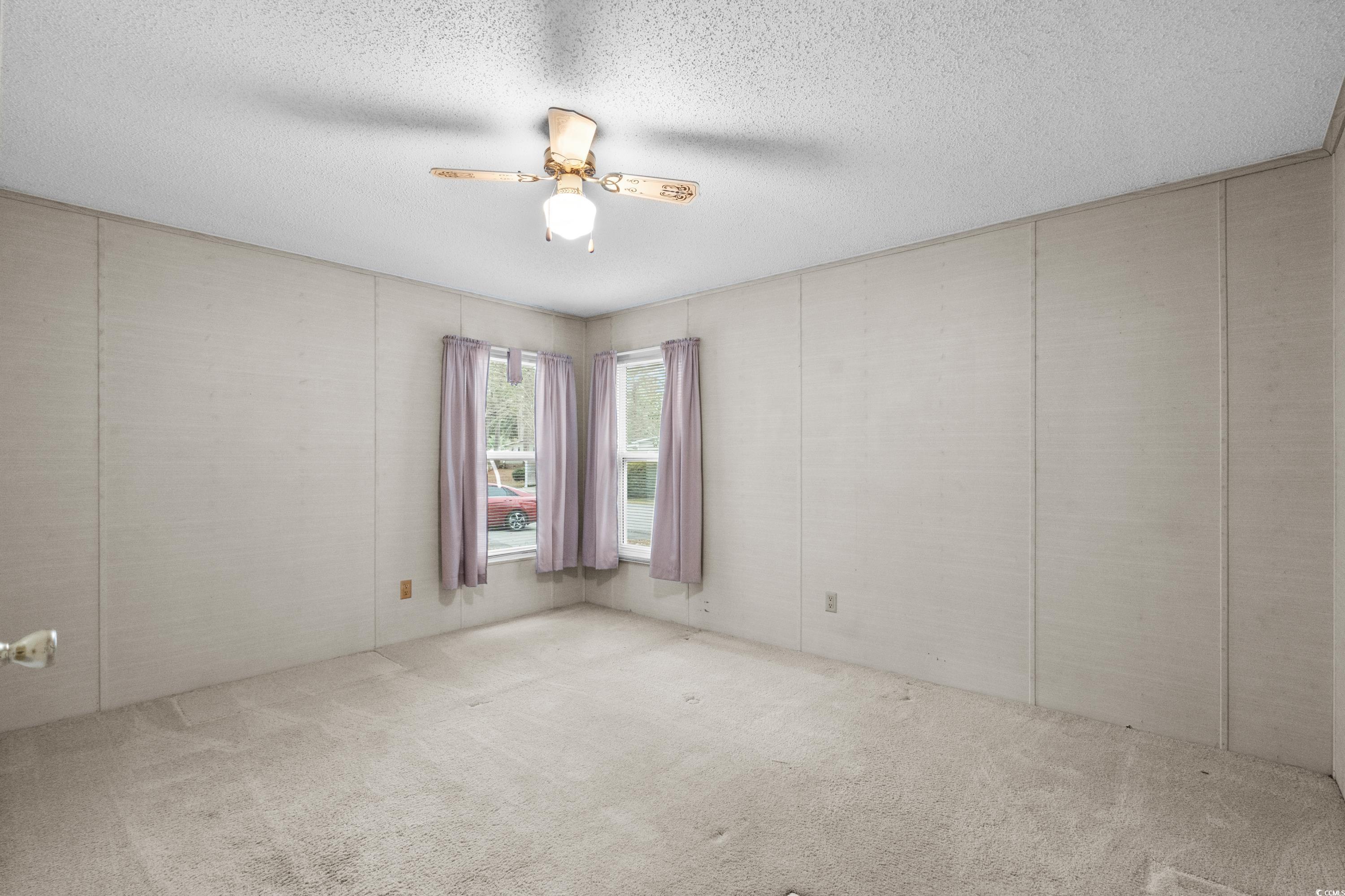 808 Carolina Drive Murrells Inlet, SC 29576 - Photo 32 of 40 Unfurnished room featuring ceiling fan, light colo