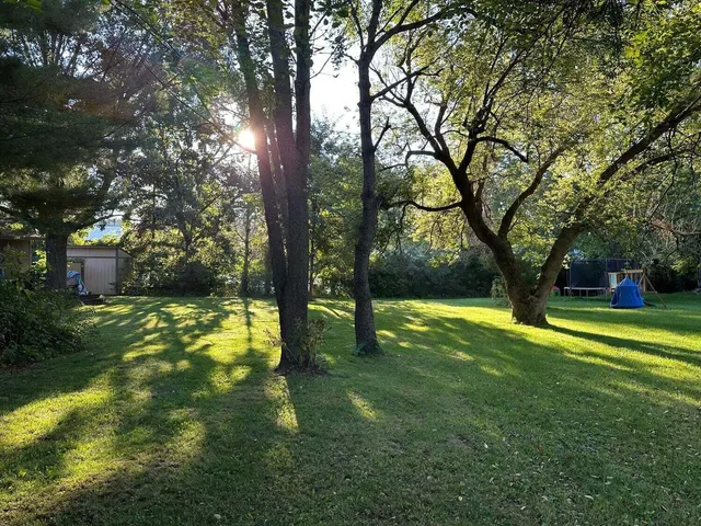 a view of swimming pool with a garden