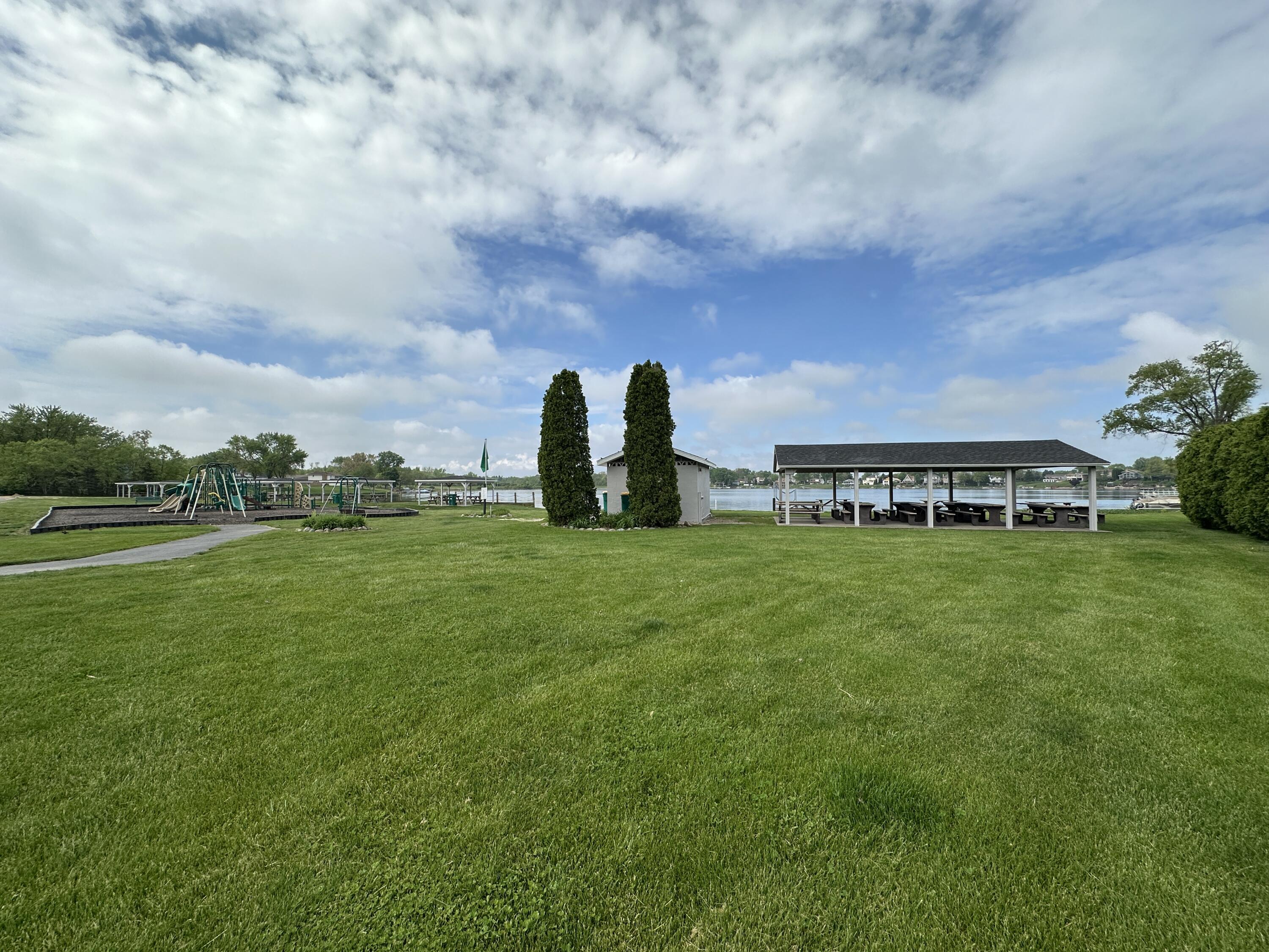1100 Country Club Drive Crown Point, IN 46307 - Photo 13 of 24 a view of a garden with tall buildings